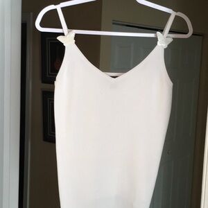 Elegant White Sleeveless top.